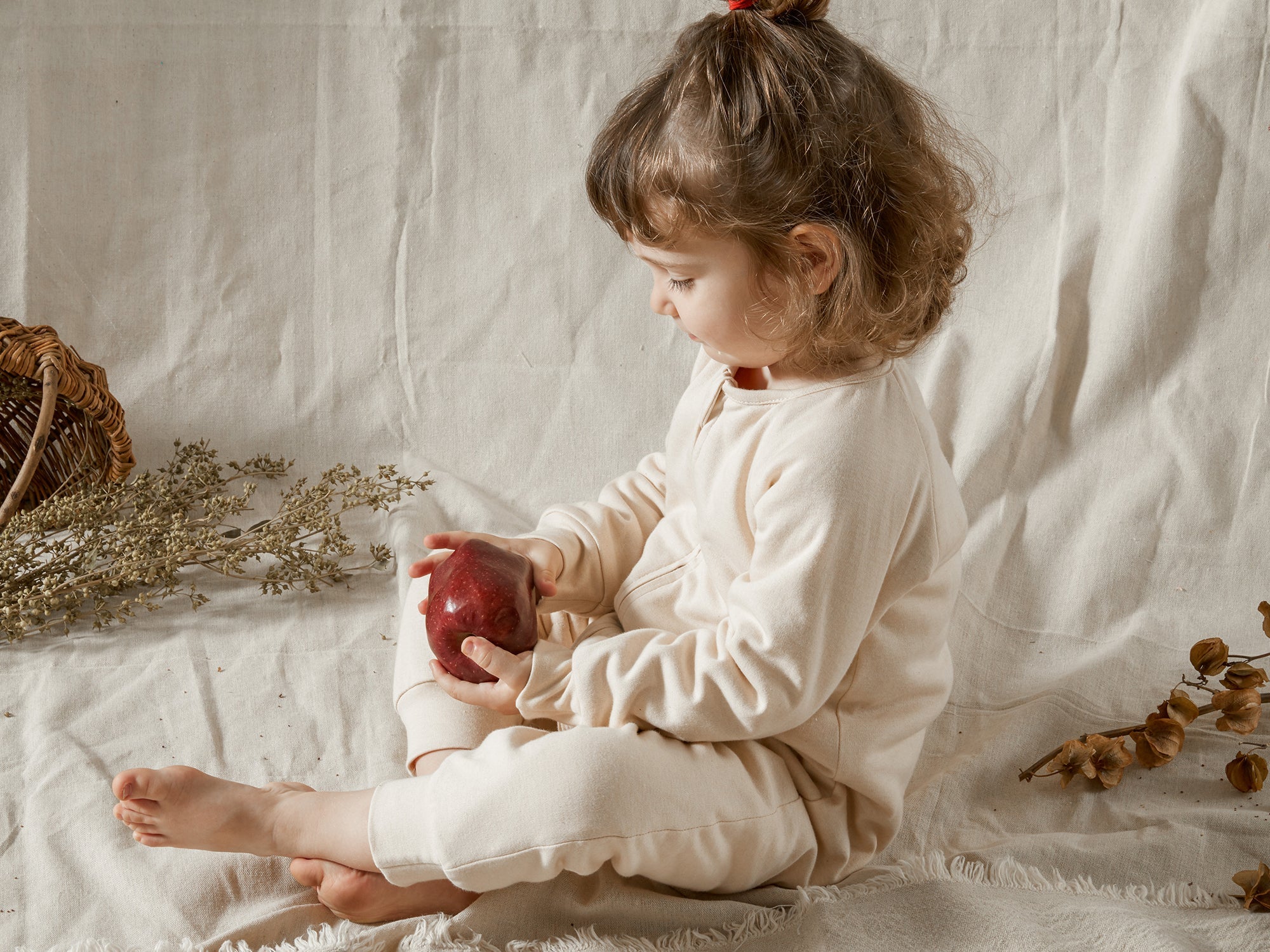 How should a sleep sack fit?