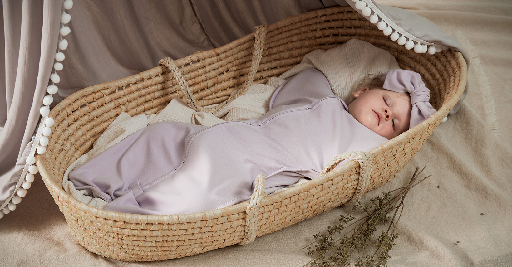 a baby boy wearing summer sleep sack