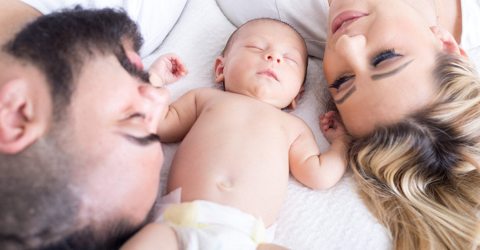 Why Do Babies Sleep With Their Arms Up?