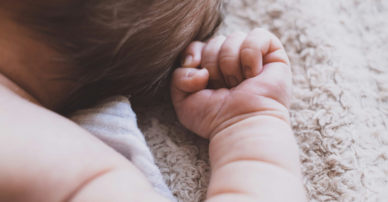 Why do babies snore while sleeping?