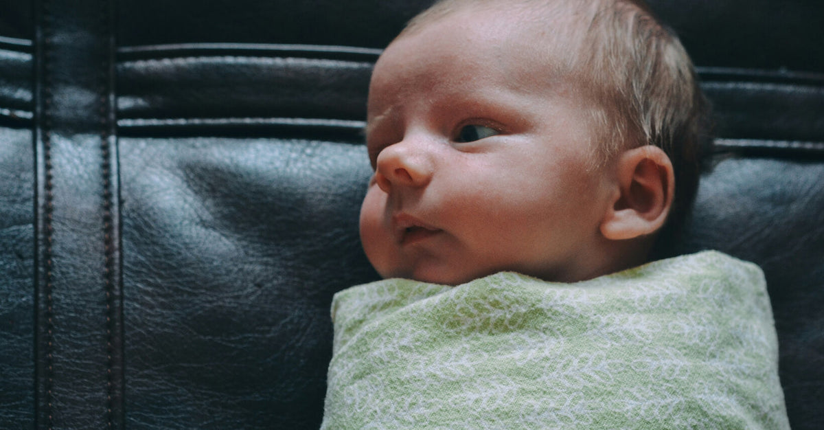 How to prevent newborn from rolling to the side while sleeping