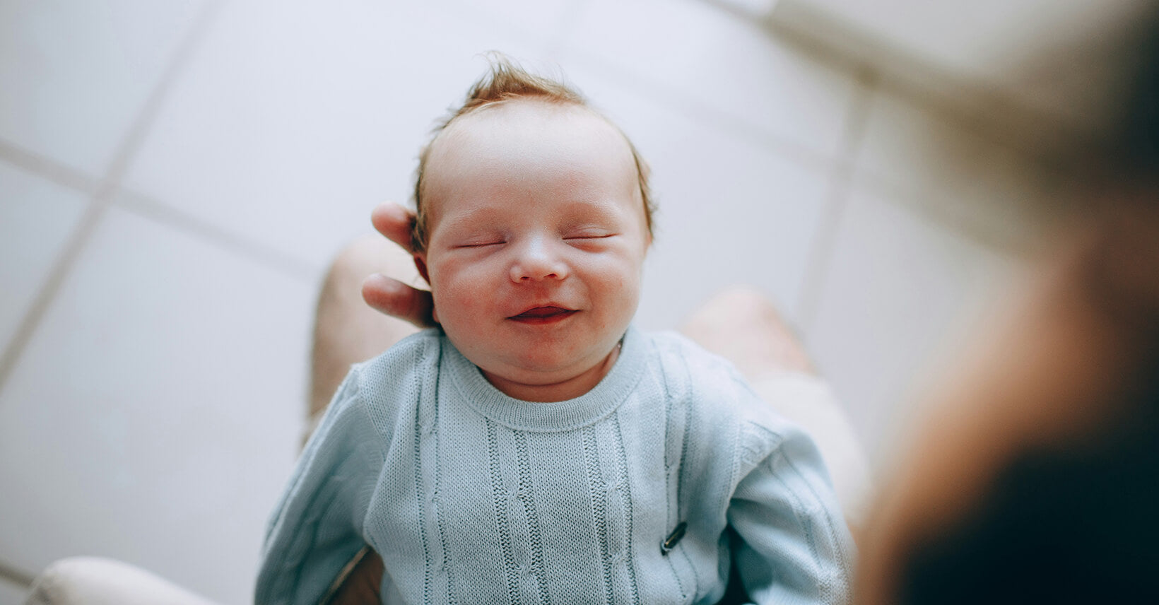 Why do Babies Smile in Their Sleep?