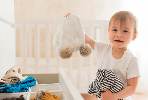 A Boy Sorting Clothes