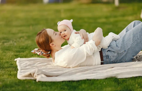 A Mom Embracing Her Baby