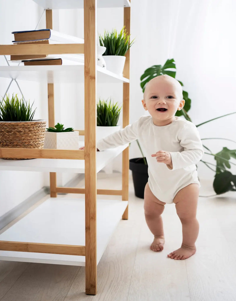 A cute baby going their first steps