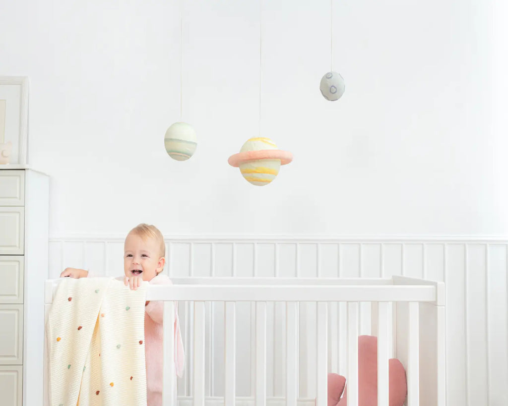 Baby girl on her crib