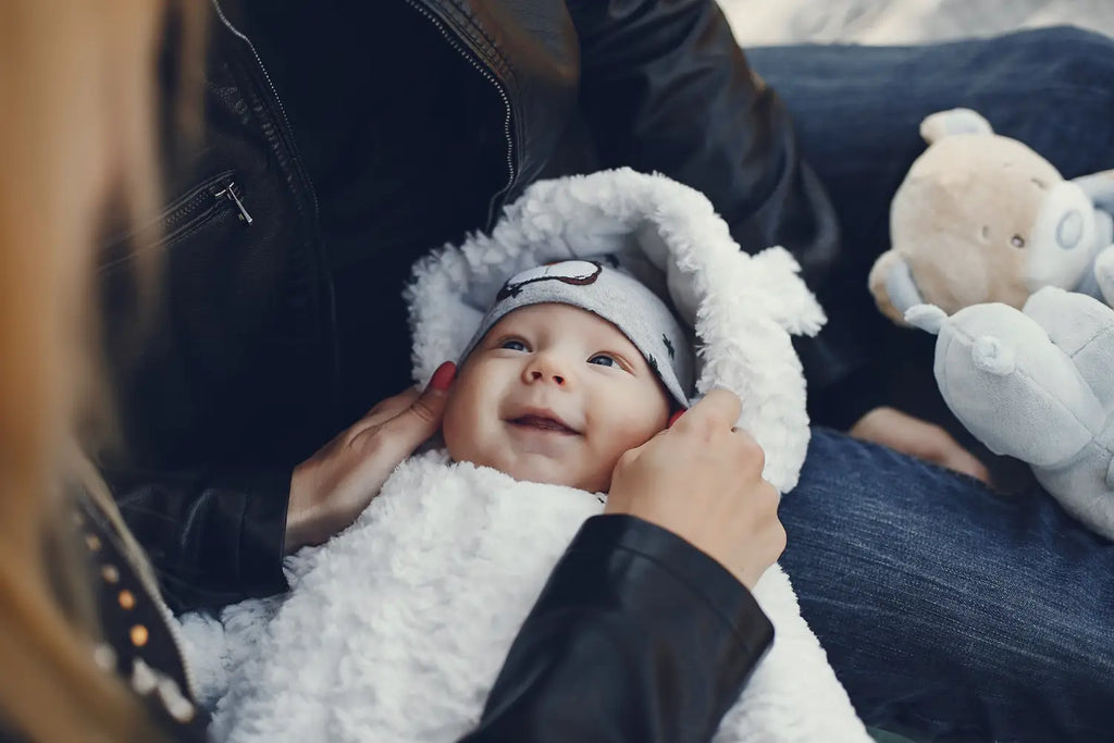Smiling baby in white
